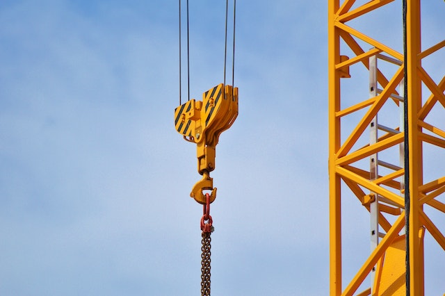 yellow overhead crane outside